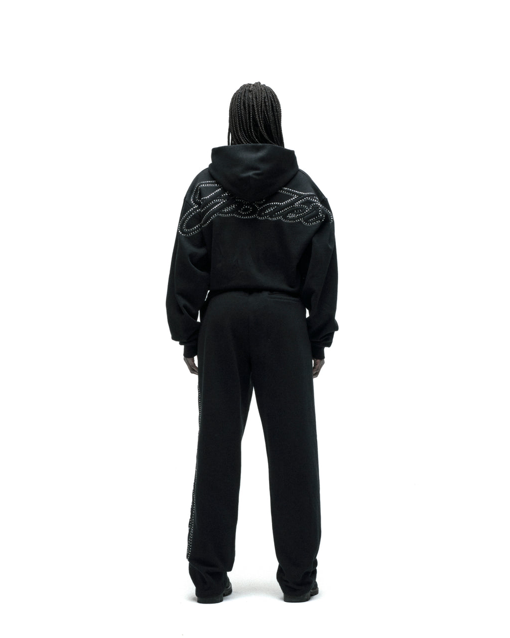 Black cotton fleece zip hoodie with rhinestone script on back, paired with matching sweatpants.