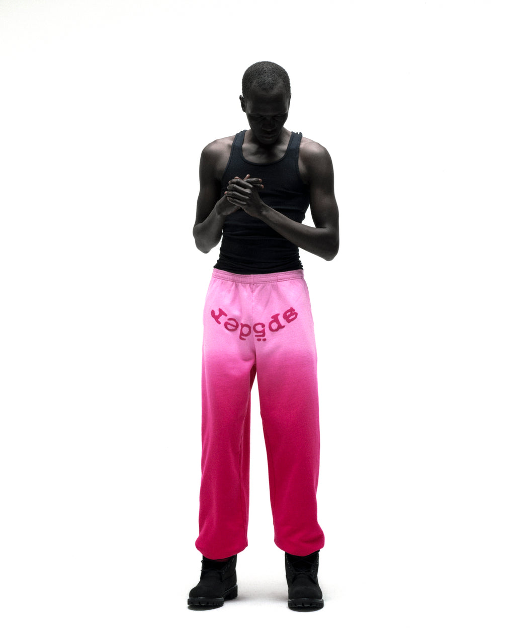 OG WEB OMBRE SWEATPANT: Pink ombre cotton fleece sweatpants with "SP5DER" text at crotch.