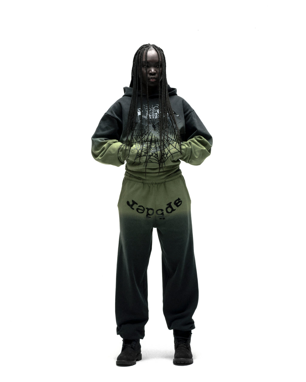 OG WEB OMBRE SWEATPANT: Black to olive green ombre cotton fleece sweatpants with "SP5DER" text.