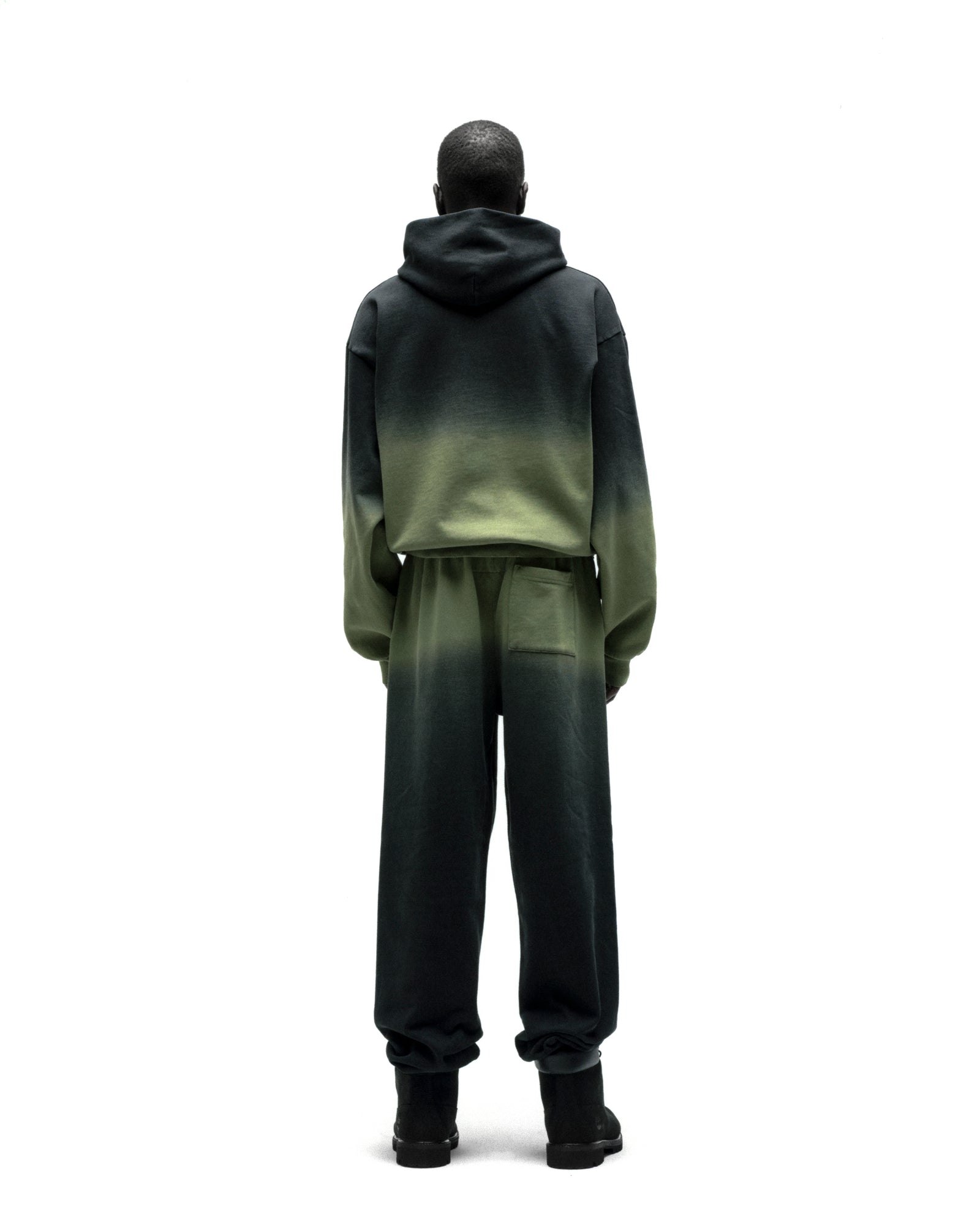 OG WEB OMBRE HOODIE and sweatpants set, 100% cotton fleece, black to lime green ombre, seen from behind.