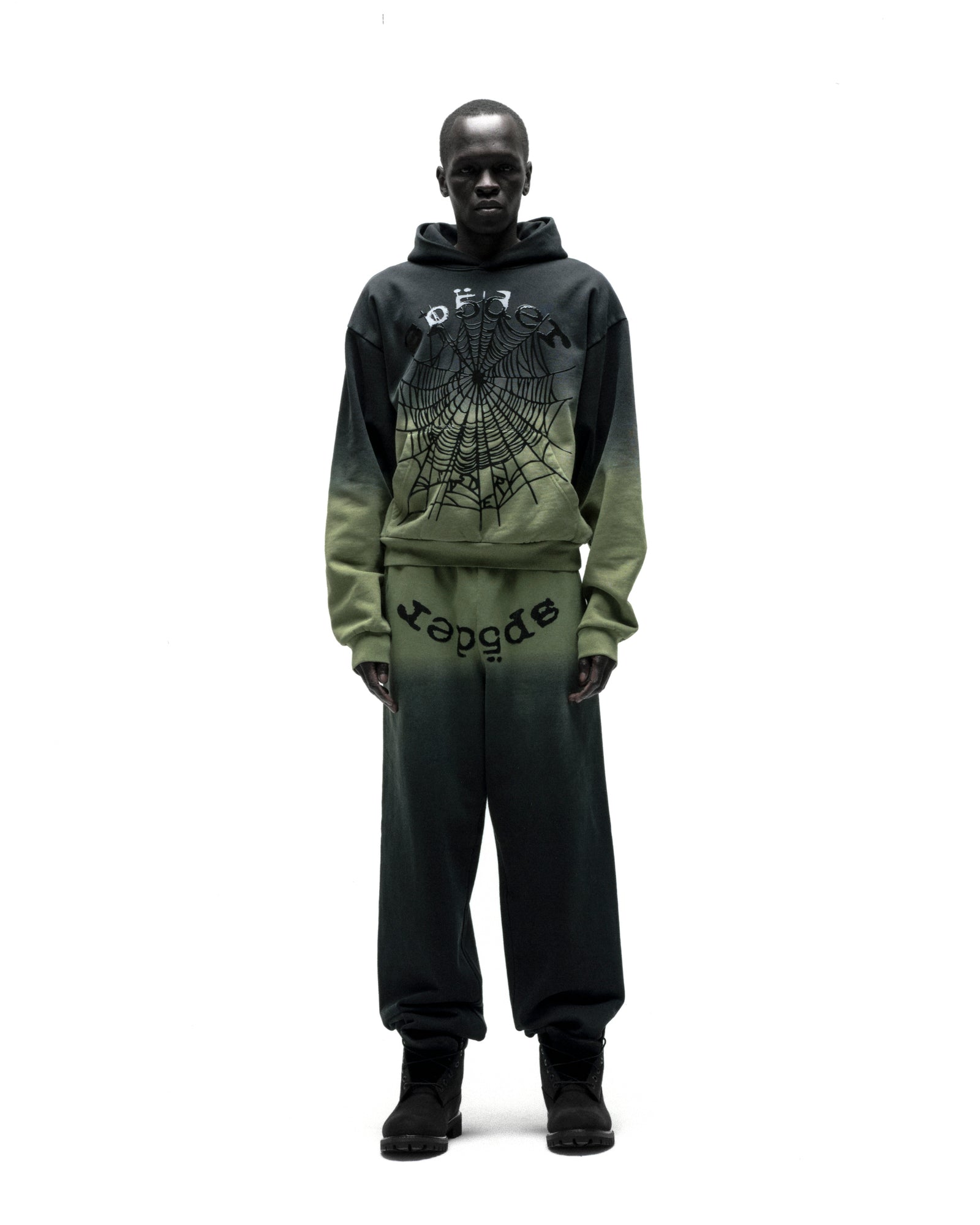 OG WEB OMBRE HOODIE and sweatpants set. Dark green to light green ombre 100% cotton fleece with black spiderweb and "OG WEB" puff print.