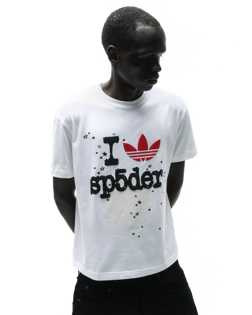 White Adidas Souvenir Tee with red Trefoil and "I SP5DER" graphic, black stars.