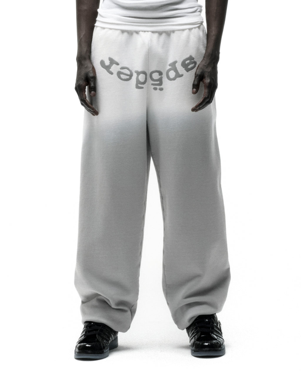 OG WEB OMBRE SWEATPANT: Light grey 100% cotton fleece sweatpants with "SP5DER" text at crotch.