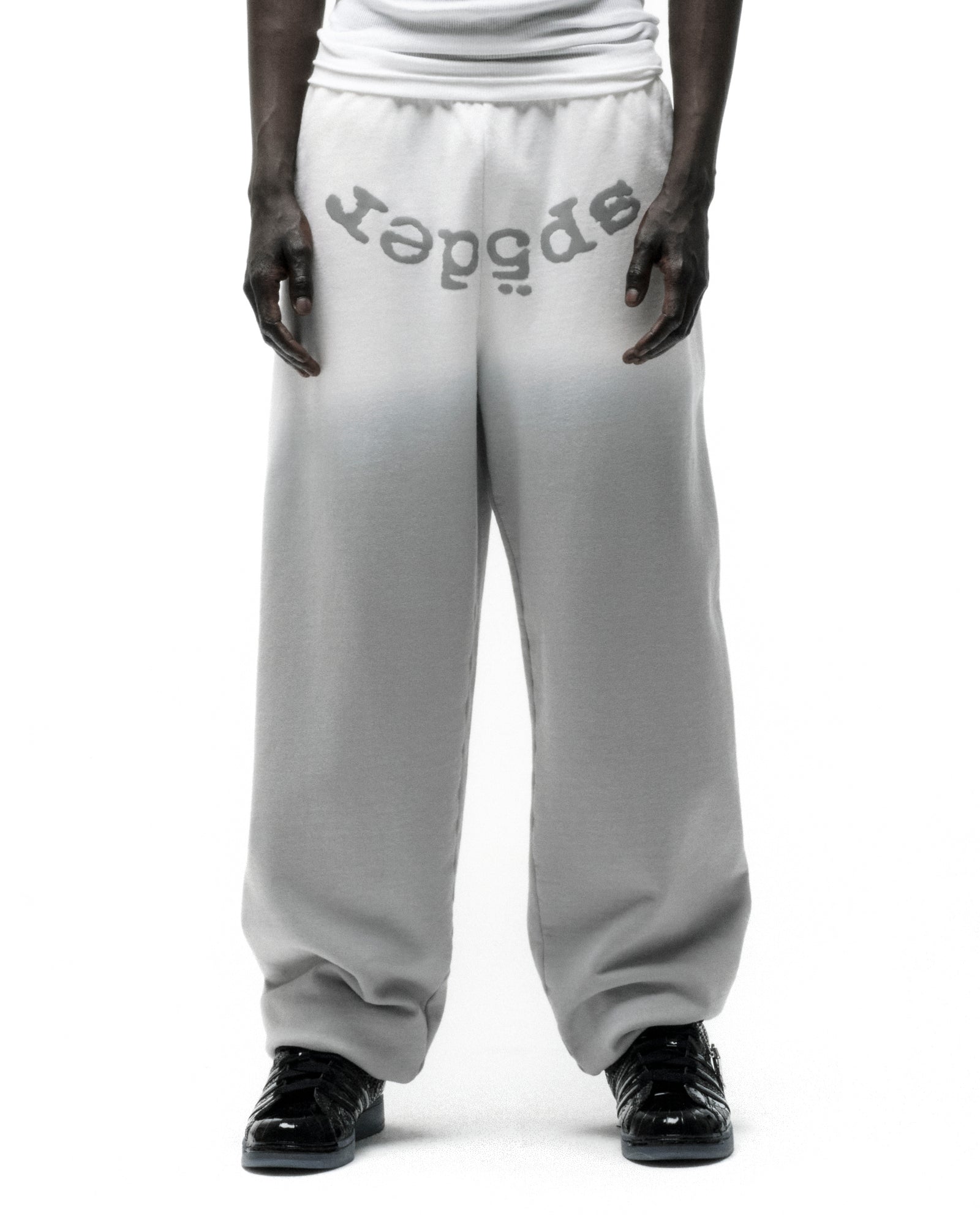 OG WEB OMBRE SWEATPANT: Light grey 100% cotton fleece sweatpants with "SP5DER" text at crotch.