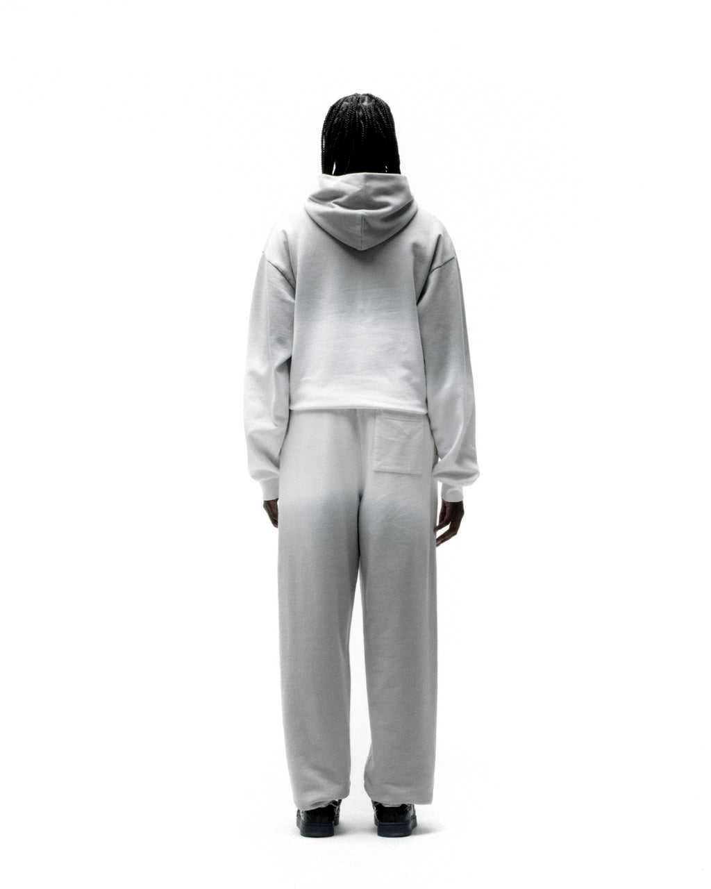 Light grey 13oz cotton fleece OG Web Ombre Hoodie and matching sweatpants, viewed from the back.
