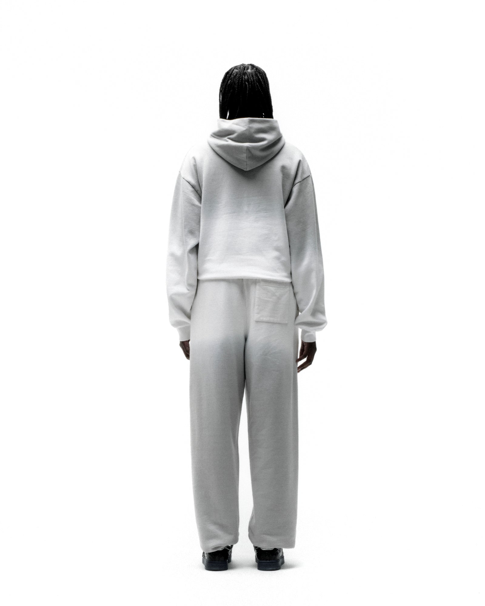 Light grey 13oz cotton fleece OG Web Ombre Hoodie and matching sweatpants, viewed from the back.