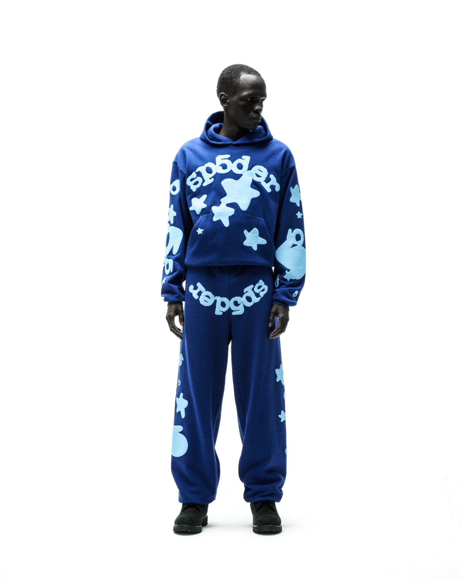 Beluga Hoodie and sweatpants set in blue 13oz cotton fleece with light blue 'SP5DER' and star puff prints.