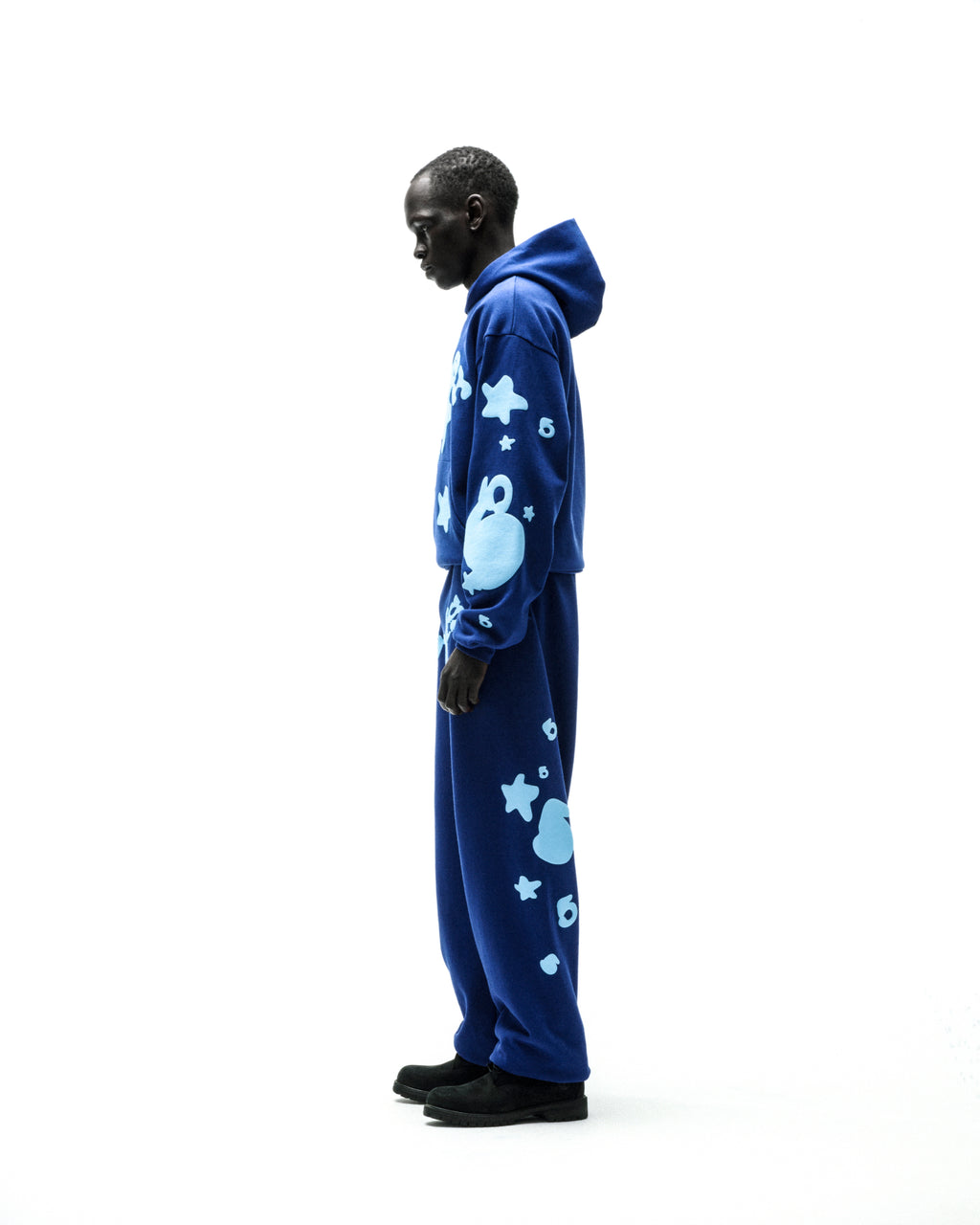 Beluga Hoodie in blue 13oz cotton fleece with light blue puff print stars and 'SP5DER' graphics.