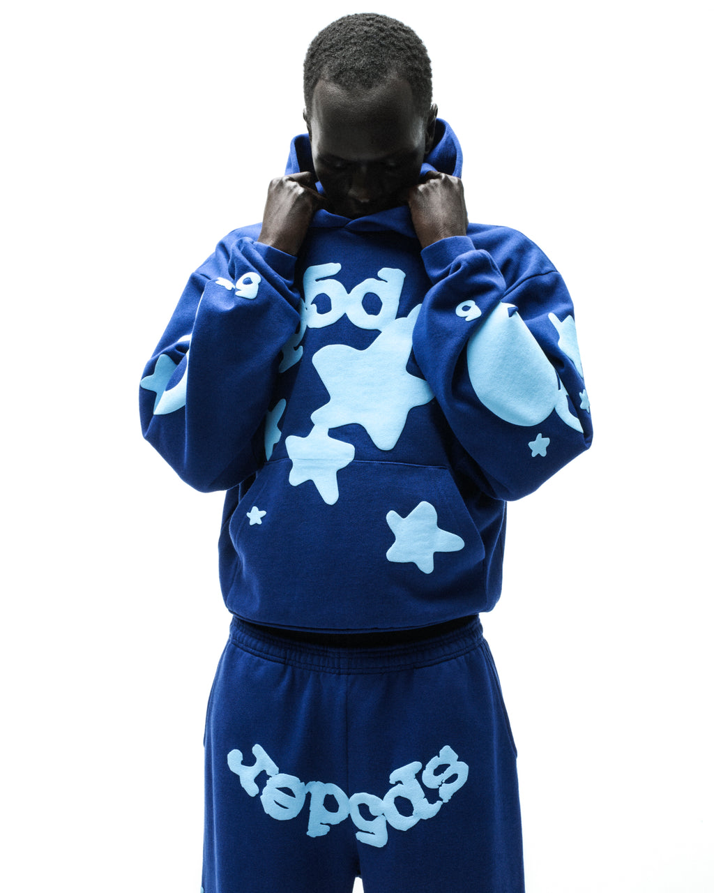 Beluga Hoodie, blue 13oz cotton fleece with light blue 'SP5DER' and star puff prints.