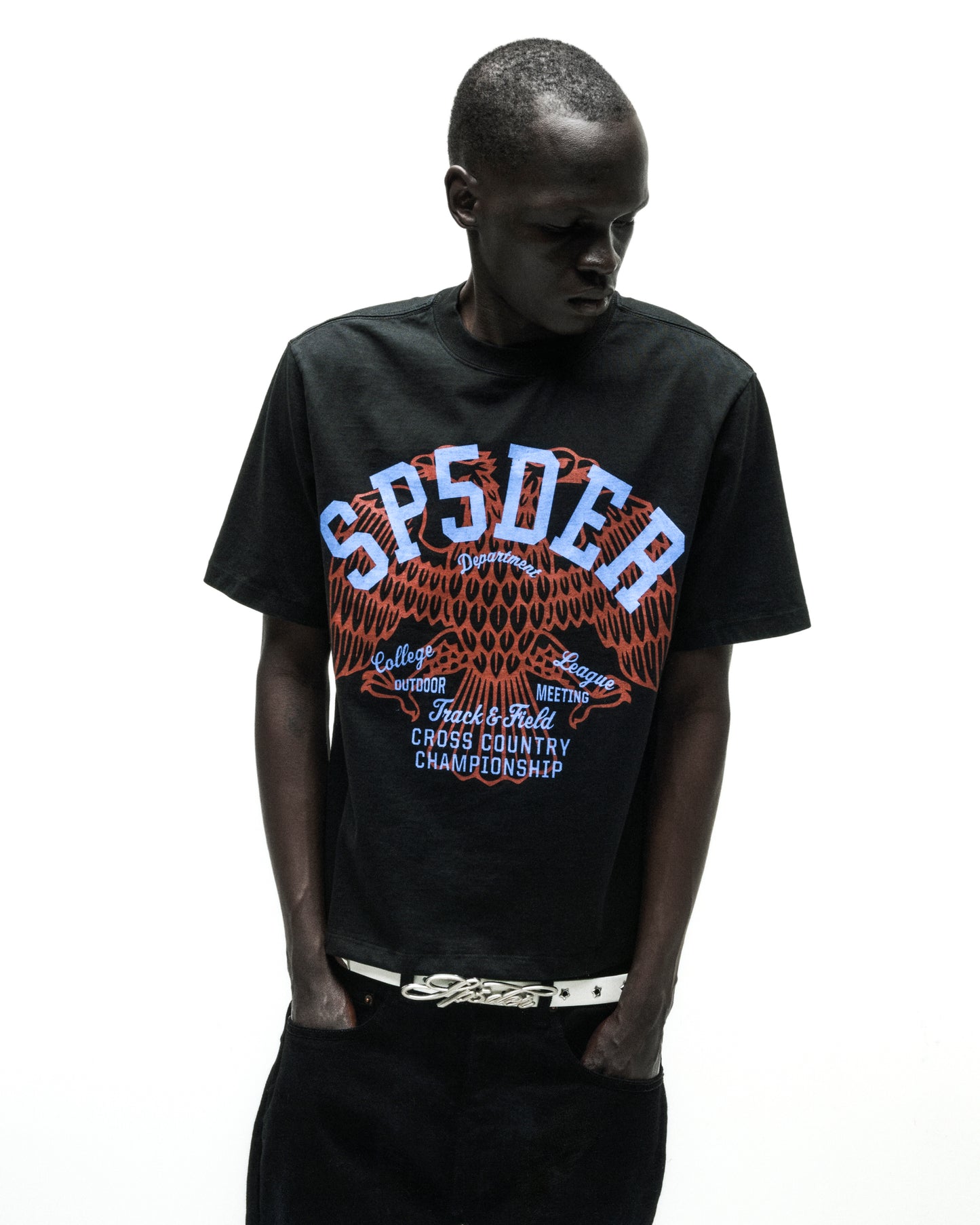 Black cotton tee with "SPSDER" in blue and red eagle graphic.
