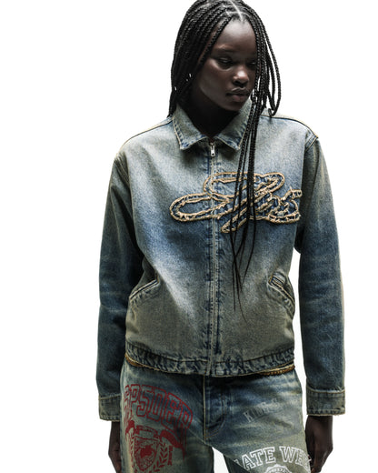 Washed blue denim work jacket with a gold chain script logo and full zipper.