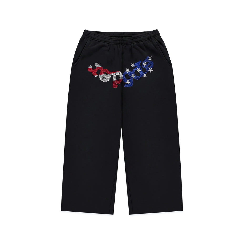 Black cotton fleece sweatshorts with a flag-inspired rhinestone OG logo graphic.