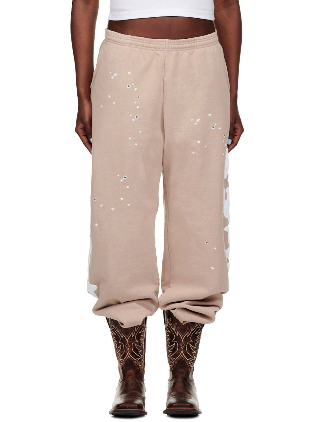 Sand Beluga Sweatpants, 23oz fleece, with white puff print stars and "Worldwide" text down legs.