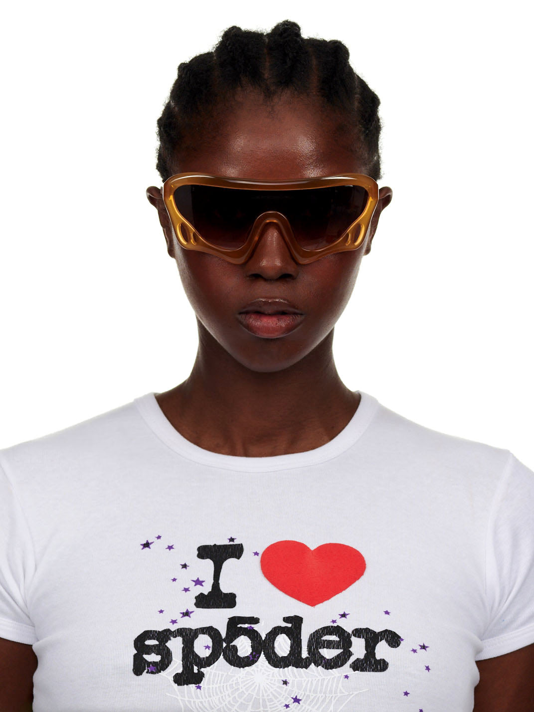 Model wearing SP5 x FLATLIST 'BEETLE' sunglasses with brown/berry gradient lenses and a white "I heart sp5der" t-shirt.