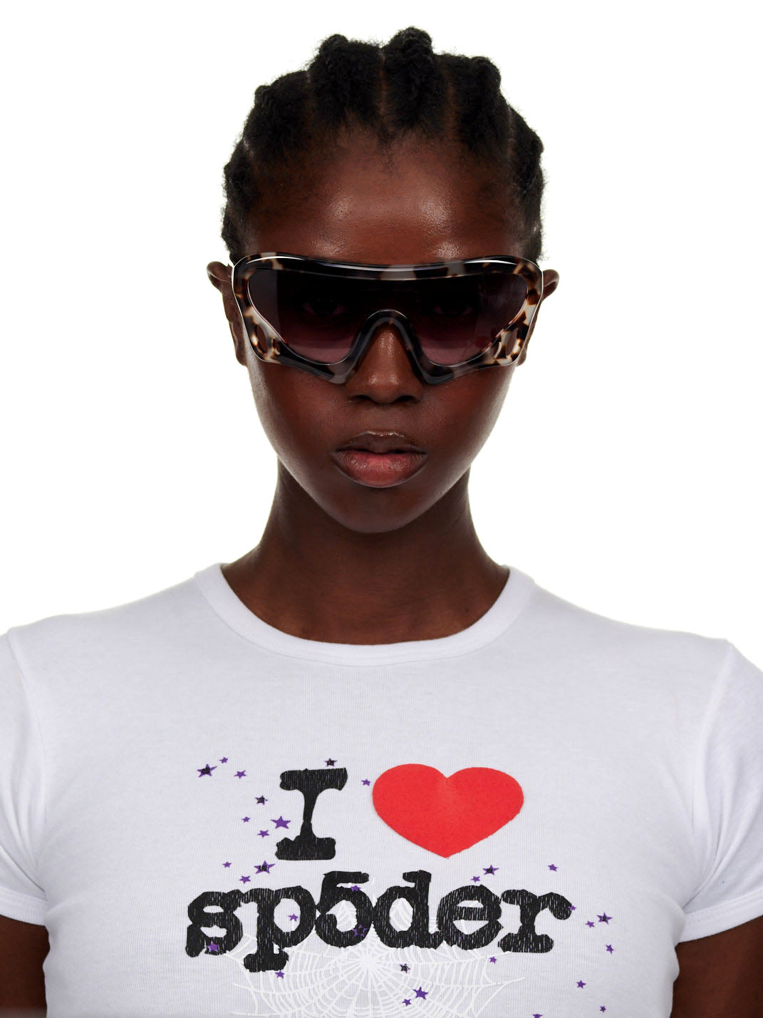 Woman wearing SP5 x FLATLIST 'BEETLE' sunglasses with tortoise-shell frames and tinted lenses.