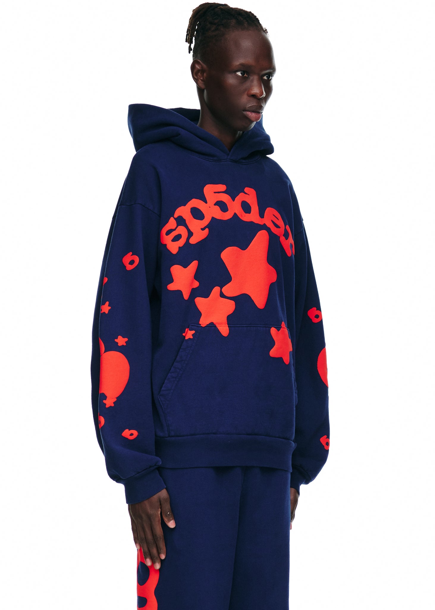 Navy 23oz fleece hoodie with red puff print "SP5DER" and star design on front, and red graphics on sleeves.