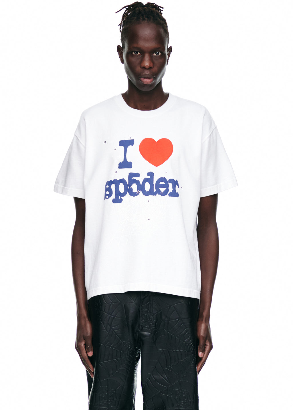 Male model in white 100% cotton "I ❤️ sp5der" graphic print tee, standard fit.