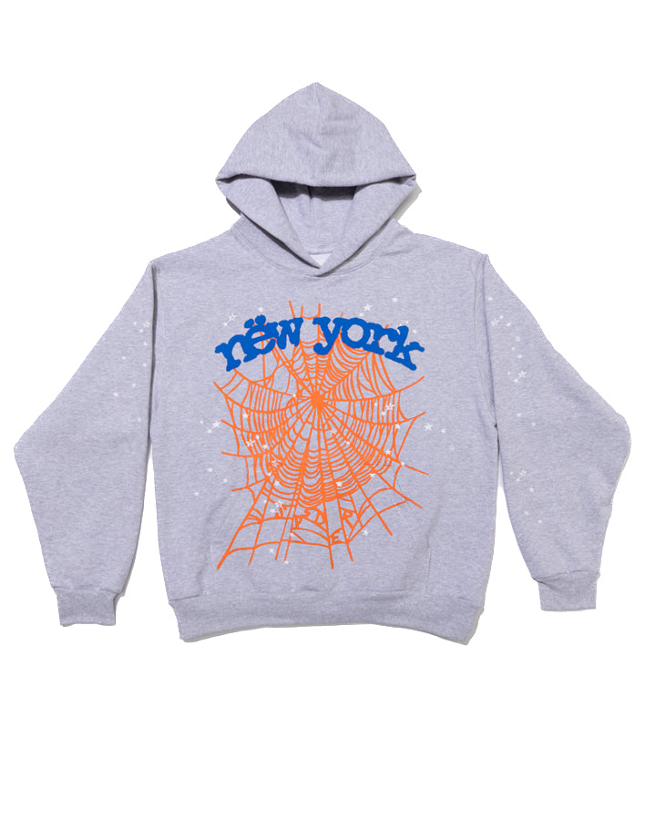 Light grey 13oz cotton fleece hoodie with orange spider web and blue "new york" puff print, subtle star details.