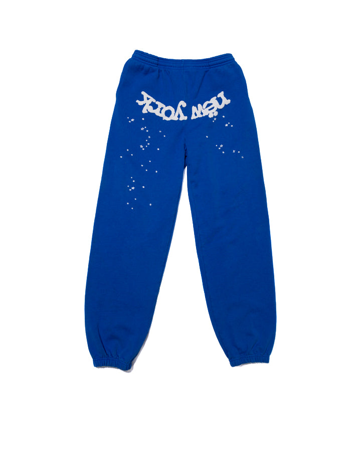 Blue cotton fleece sweatpants with white "NEW YORK" text and scattered stars.