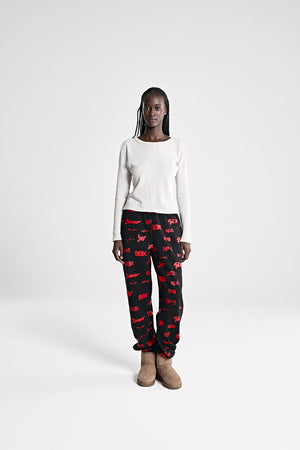 BLACK SEX AOP SWEATPANT ON MODEL