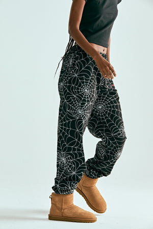 BLACK EMBROIDERED AOP SWEATPANT ON MODEL