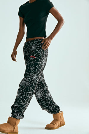 BLACK EMBROIDERED AOP SWEATPANT ON MODEL