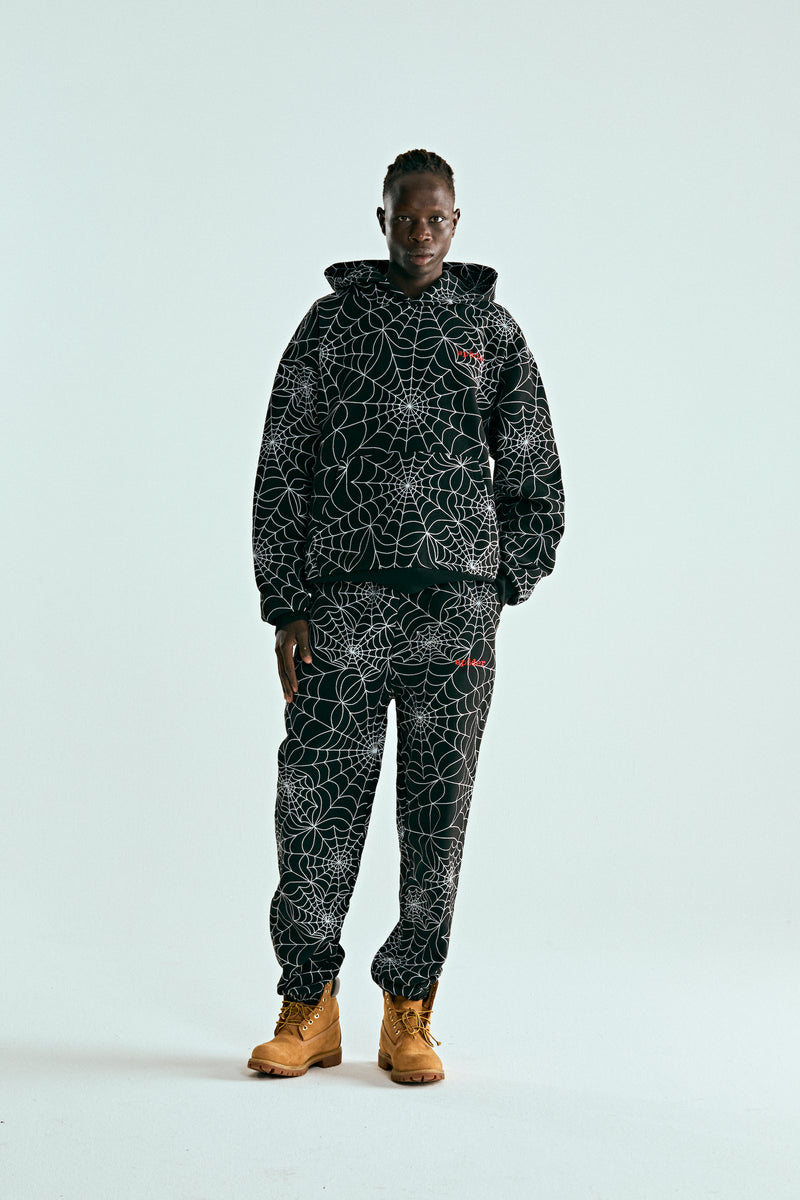 BLACK EMBROIDERED AOP HOODIE ON MODEL