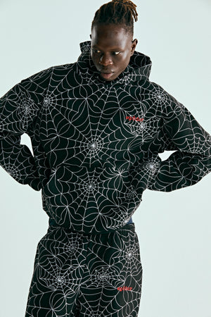 BLACK EMBROIDERED AOP HOODIE ON MODEL