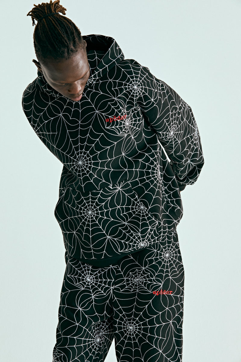 BLACK EMBROIDERED AOP HOODIE ON MODEL