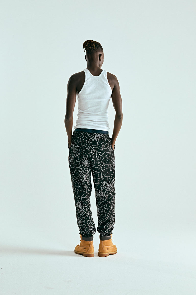 BLACK EMBROIDERED AOP SWEATPANT ON MODEL