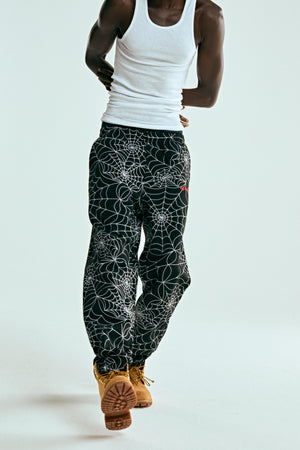 BLACK EMBROIDERED AOP SWEATPANT ON MODEL