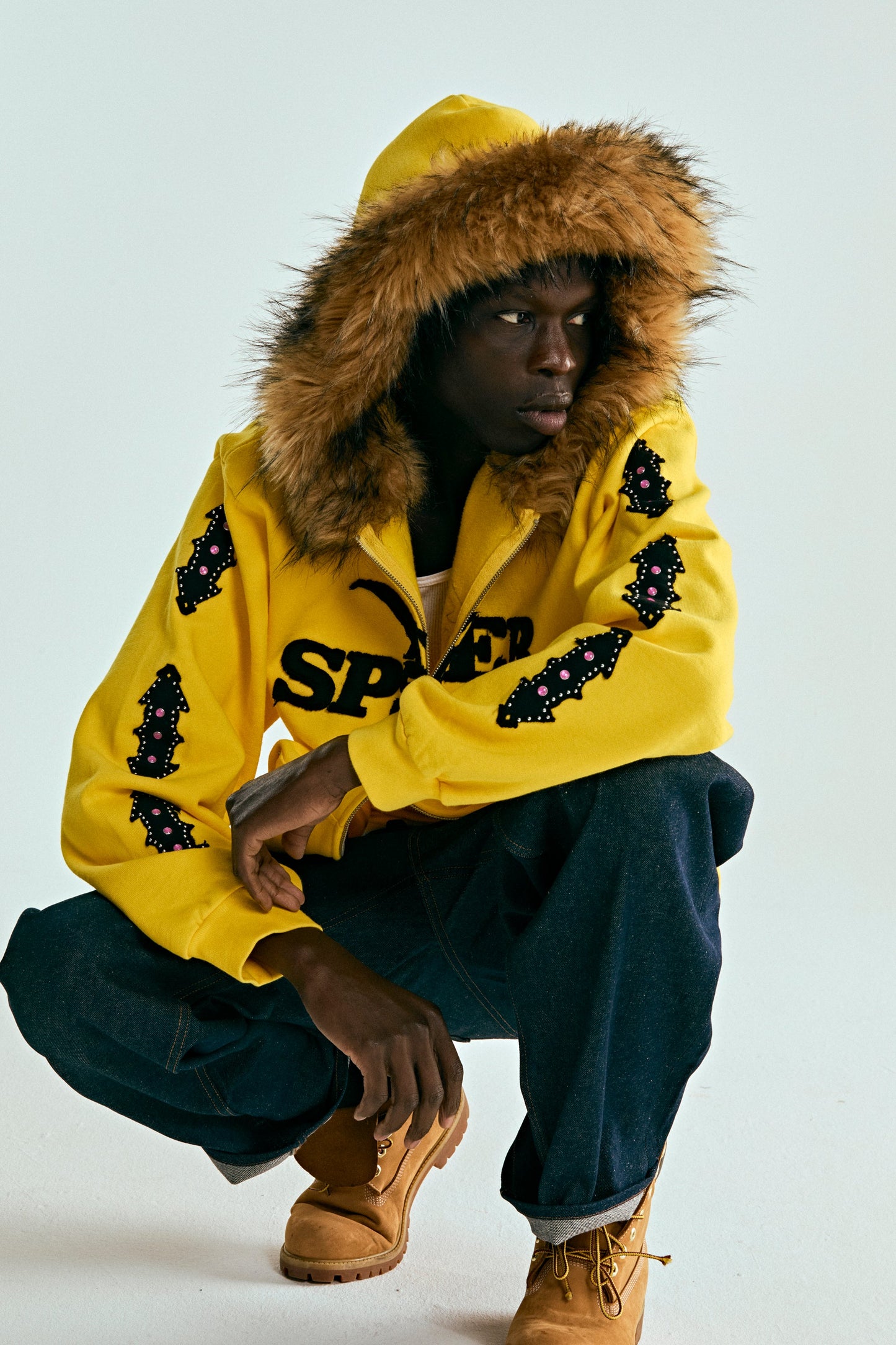 YELLOW FUR HOODED ZIP UP SWEATSHIRT ON MODEL