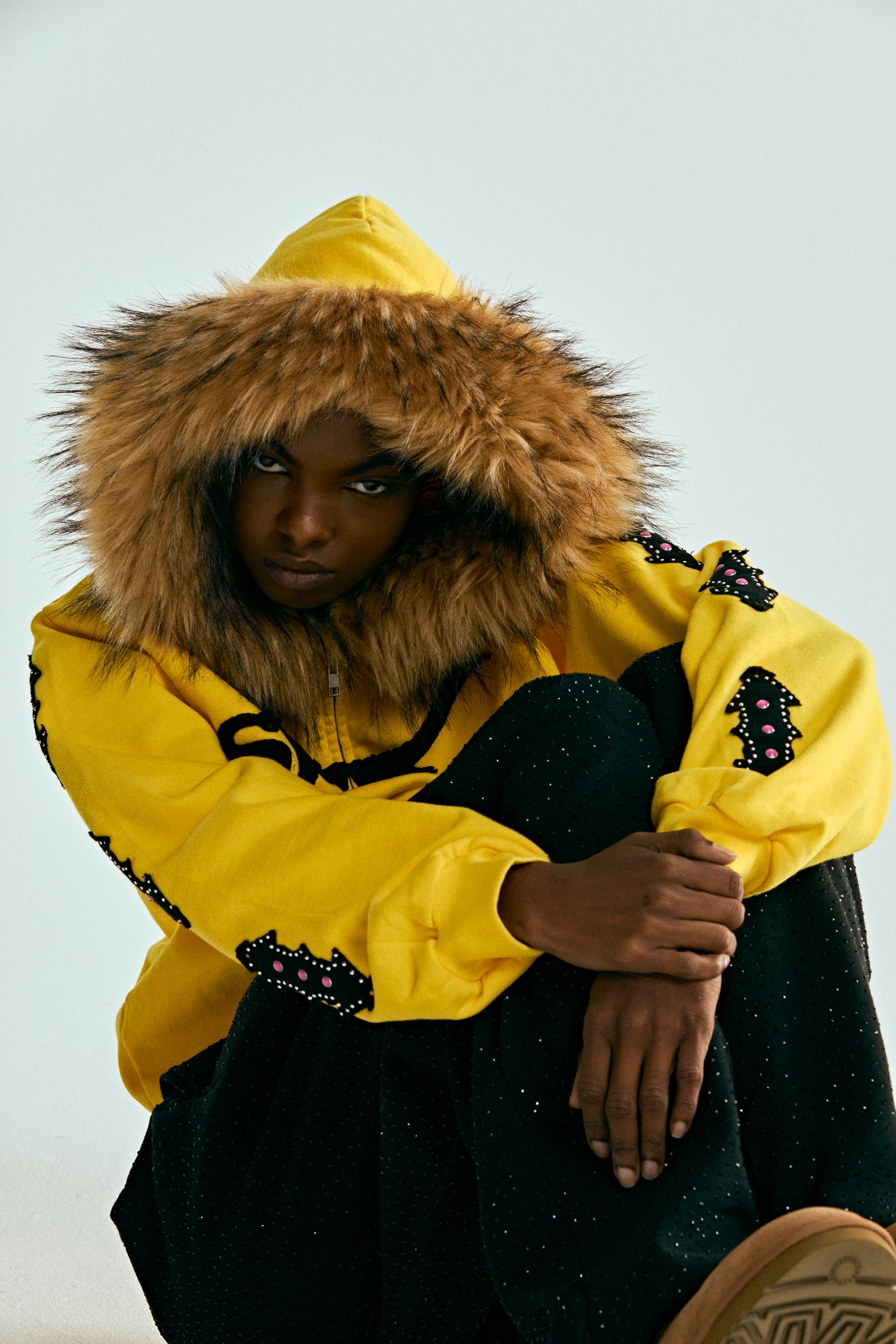 YELLOW FUR HOODED ZIP UP SWEATSHIRT ON MODEL
