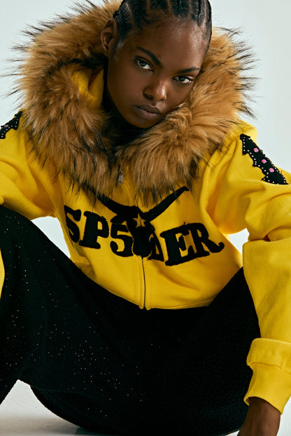 YELLOW FUR HOODED ZIP UP SWEATSHIRT ON MODEL