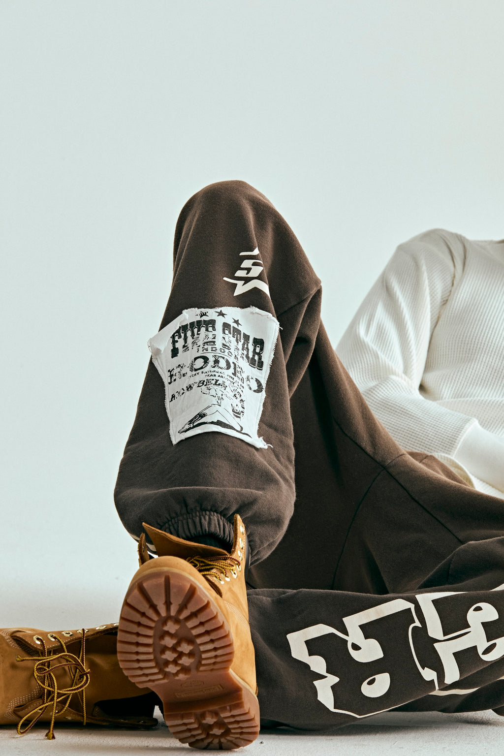 Brown 5STAR RODEO SWEATPANT with distressed patch, SP5DER text, and side stripe.