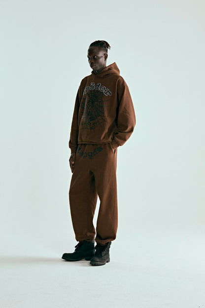 Brown OG Web Hoodie and sweatpants with SP5DER logo, web, and rhinestone applique.