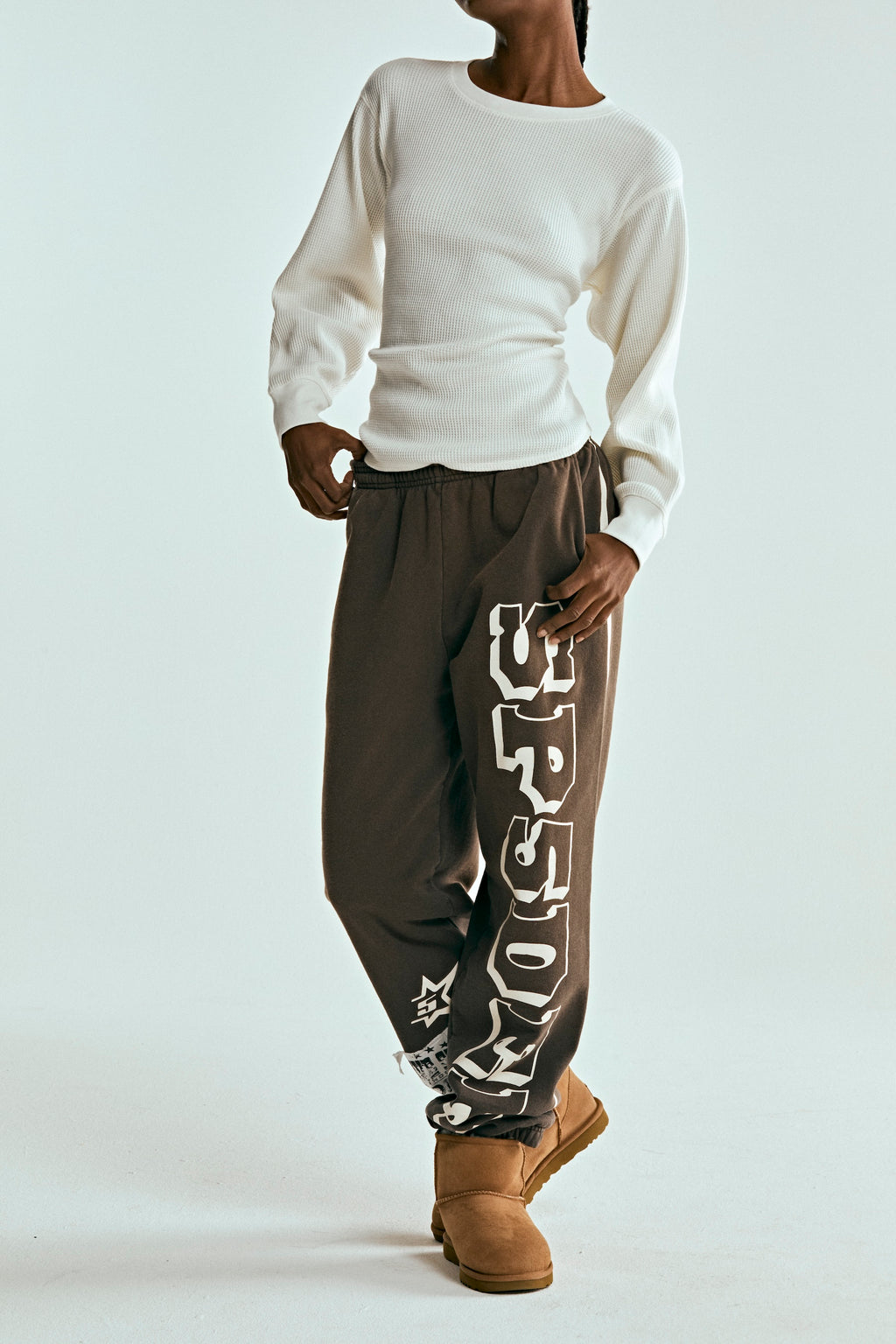 Brown 5STAR RODEO SWEATPANT with white SP5DER text, distressed patch, and side stripe.