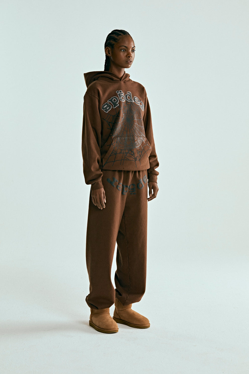 Brown OG WEB HOODIE and sweatpants set with rhinestone SP5DER text and web print.