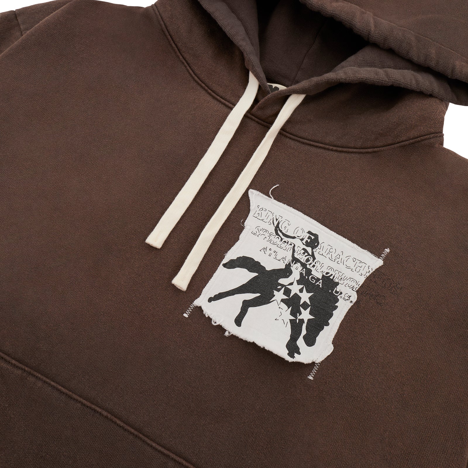 Brown 5STAR Rodeo hoodie with distressed patch, white drawstrings, and kangaroo pocket.