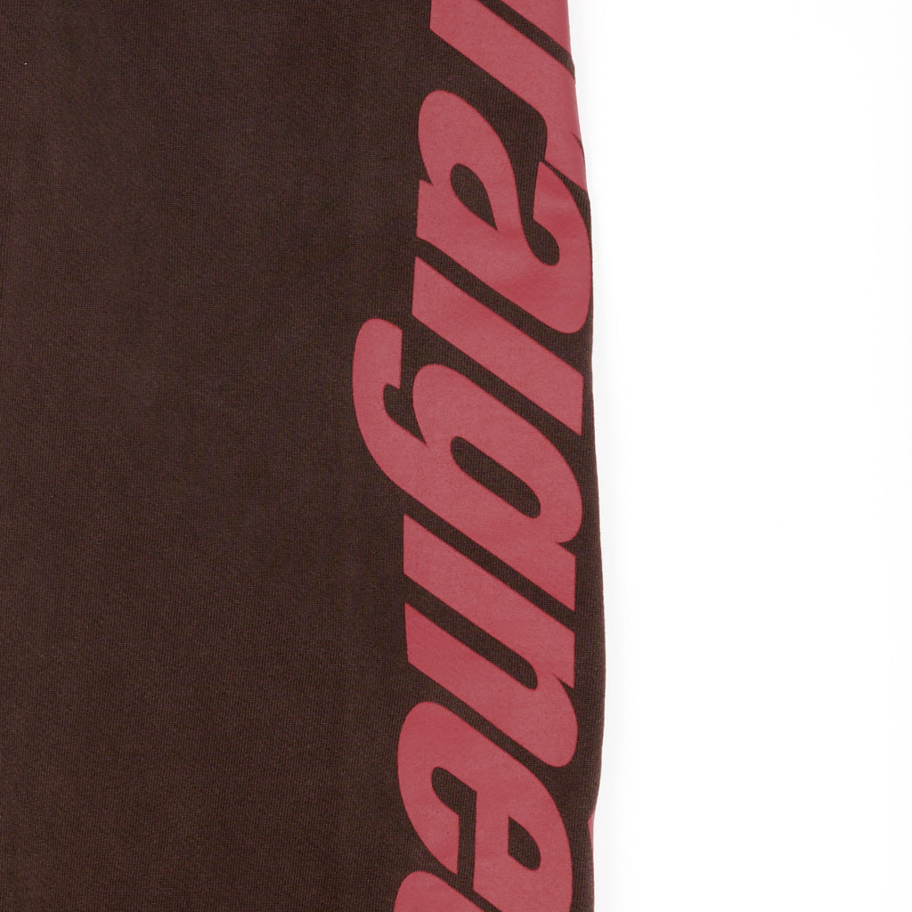Brown 23oz fleece sweatpant with a red 'Araignee' puff print down the leg.