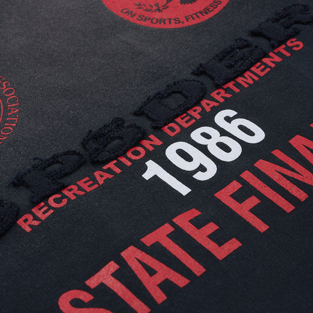 Dark grey French terry sweatshirt with red and white "1986 RECREATION DEPARTMENTS STATE FINAL" text, SP5DER patches.