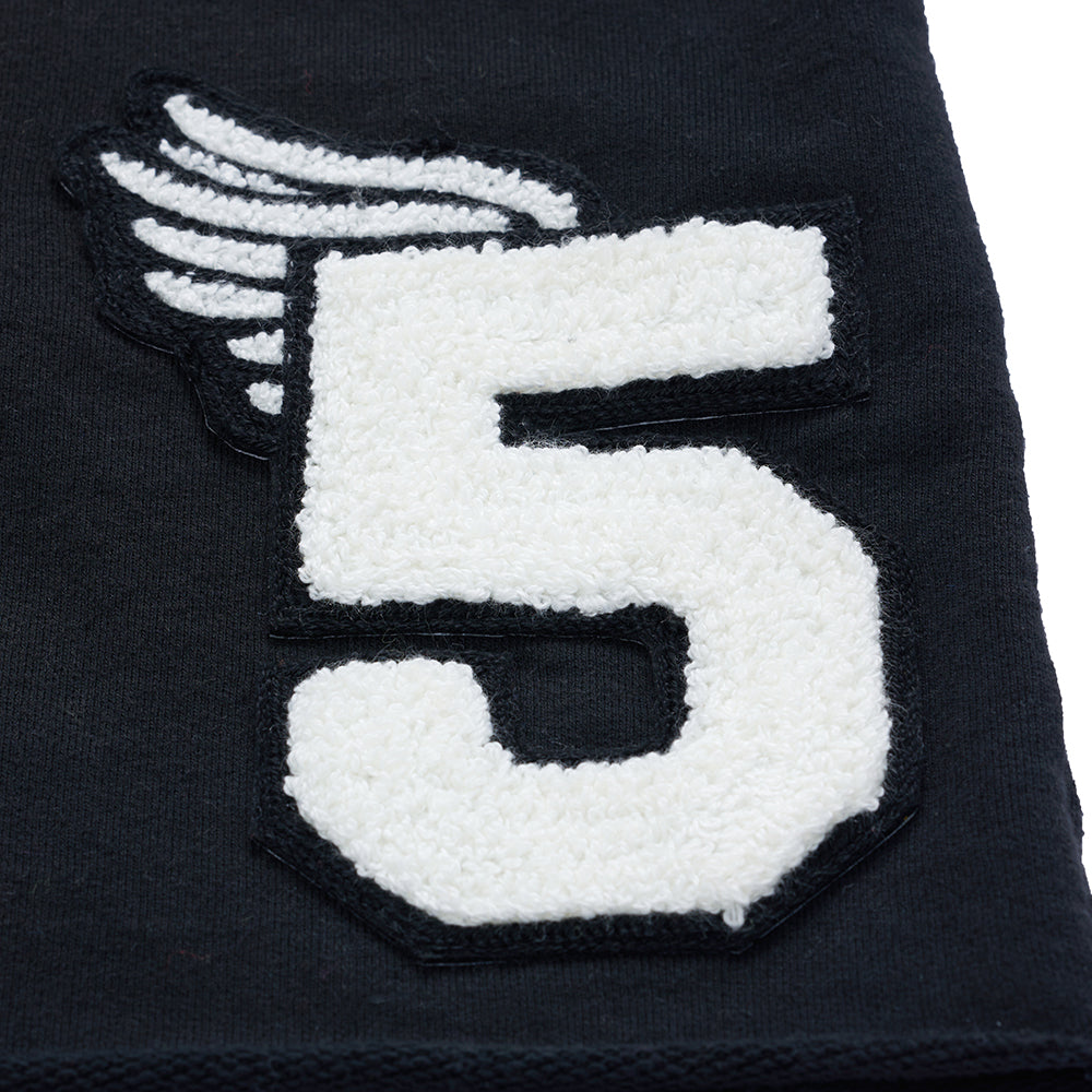 Black French terry sweatshort with a white chenille "5" patch and winged embroidery.