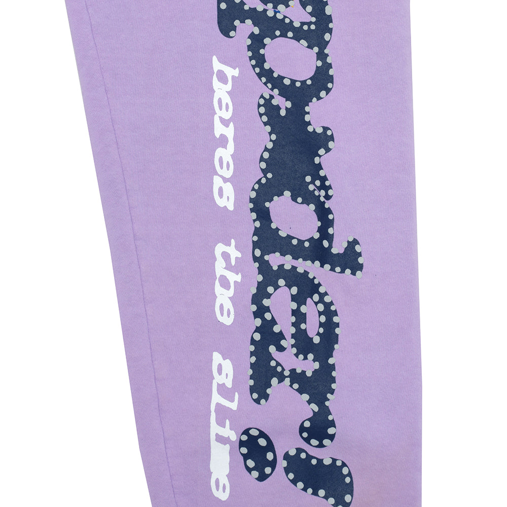 AÇAÍ SP5DER SWEATPANT in lavender 23oz fleece with blue puff print SP5DER motif and white star prints.