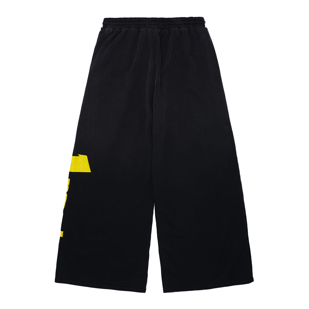 Vintage black 23oz French terry JUMBO SWEATPANT with yellow screen print down the leg.
