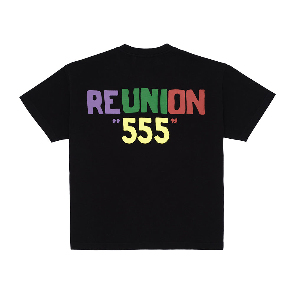 Black oversized cotton jersey tee with "REUNION" in colorful block letters and yellow "555" graphic on back.
