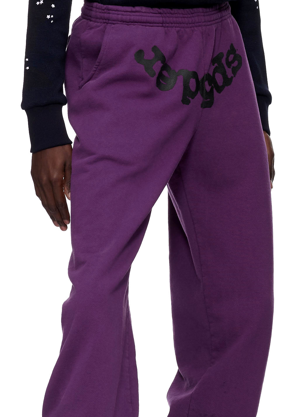 Purple 23oz fleece sweatpants with black puff print "SP5DER" logo and web print.