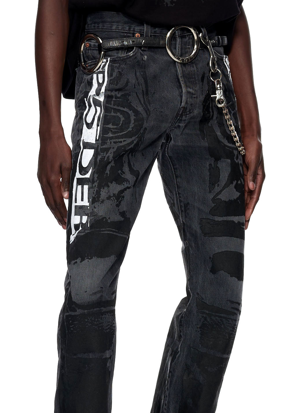 Vintage black Levi's 501 MOTO JEAN with white SP5DER graphic, tonal moto design, and belt with chain.