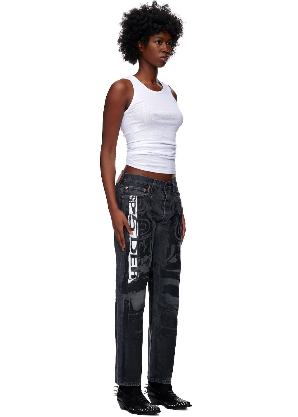 Model wearing vintage black Levi's 501 MOTO JEAN with white SP5DER graphic and tonal moto design.