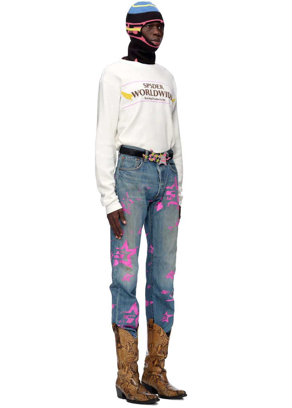 Vintage Levi's 501 jeans with pink "5 Star" graphic, pink SP5DER back tab, and snake-print boots.