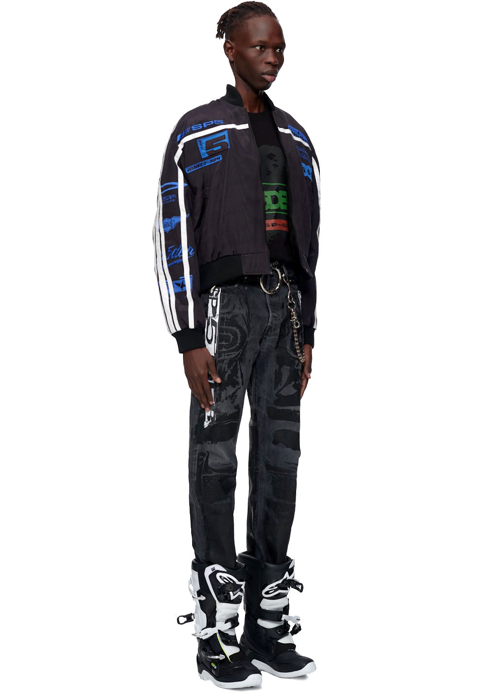 Black satin bomber jacket with blue and white graphic stripes, worn by a model.